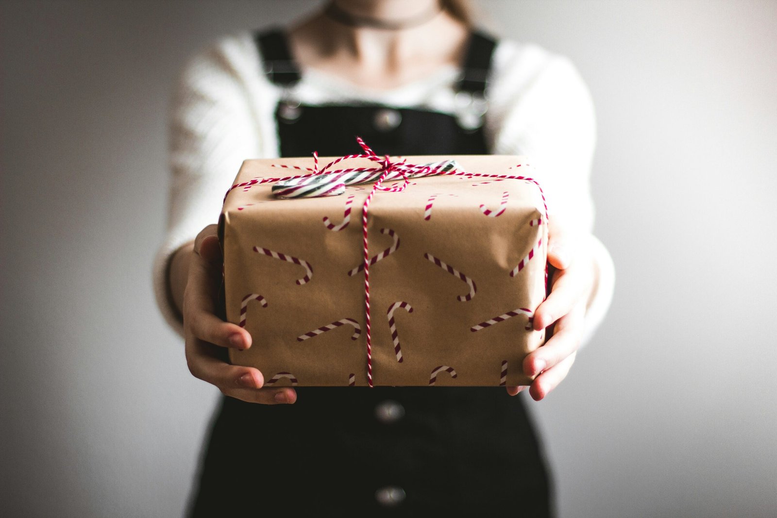 A lady holding a gift